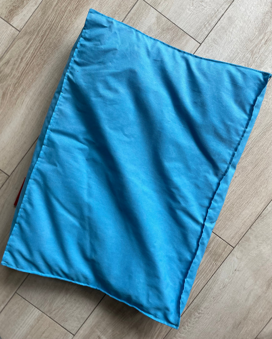 Isi Mini - coussin à langer turquoise