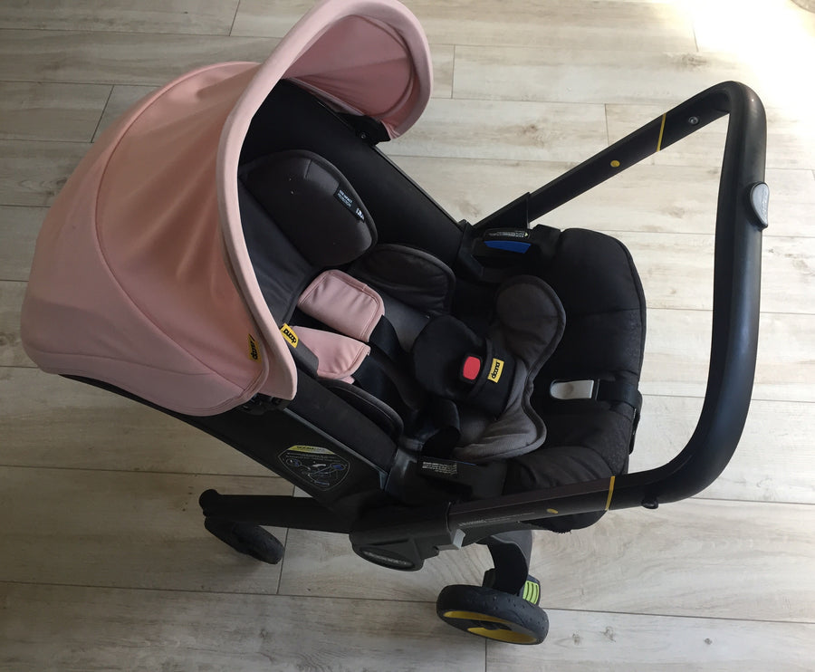 Siège auto et poussette Doona en un: Blush Pink